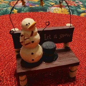 Snowman Figurine on Bench
